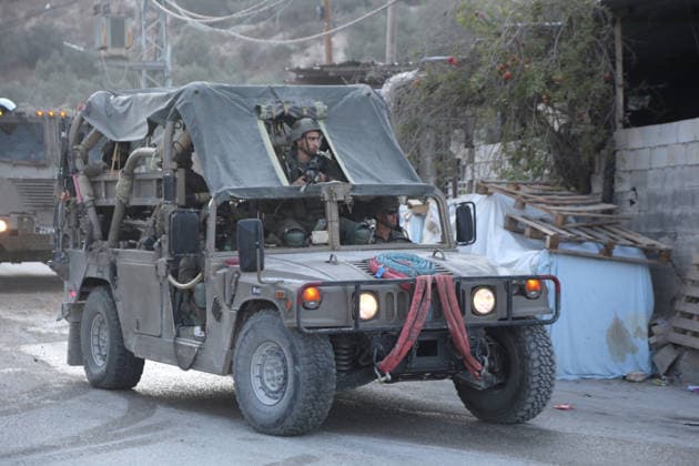 Palestinian-Israeli conflict in Nablus - 24 Sep 2026 An Israeli soldier takes a position aboard an Israeli military jeep following the demolition of the family home of Palestinian prisoner Dawas Hassoun. Israeli army forces demolished the family home of Palestinian prisoner Dawas Hassoun, who is accused of killing an Israeli settler, in the village of Beit Marin, northwest of Nablus in the West Bank. Nablus Palestine Copyright: xNasserxIshtayehx xSOPAxImagesx Nishtayeh580