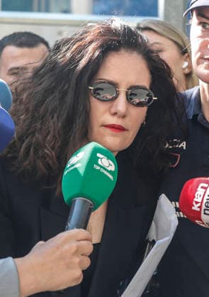 September 24, 2026, Tirana, Tirana, Albania: Vlora Hyseni, former head of Albania s intelligence service, leaves offices of SPAK (Special Anticorruption Prosekutor) after a judge ordered her under house arrest on suspicion of disclosing classified information to unauthorized persons. Tirana Albania  - ZUMAb266 20260924_zip_b266_002 Copyright: xArmandoxBabanix