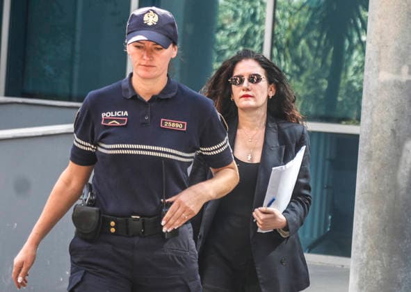 September 24, 2026, Tirana, Tirana, Albania: Vlora Hyseni, former head of Albania s intelligence service, leaves offices of SPAK (Special Anticorruption Prosekutor) after a judge ordered her under house arrest on suspicion of disclosing classified information to unauthorized persons. Tirana Albania  - ZUMAb266 20260924_zip_b266_003 Copyright: xArmandoxBabanix