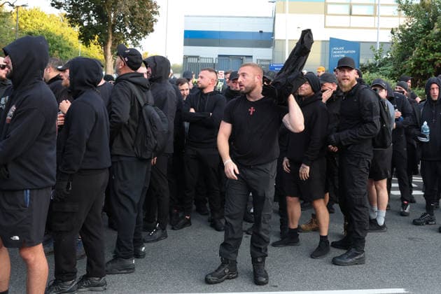 September 24, 2026, Basingstoke, Hampshire, UK: Basingstoke, UK. Members of The Patriot Platform and supporters Protest outside a police station where Daniel Thomas, also know as Danny Tommo, is being held, in Basingstoke, Hampshire. Anti-migrant protester Daniel Thomas has been arrested on suspicion of criminal damage with intent to endanger life after an incident in the English Channel. Basingstoke UK  - ZUMAl94_ 20260924_zaf_l94_030 Copyright: xJacquelinexLawriex
