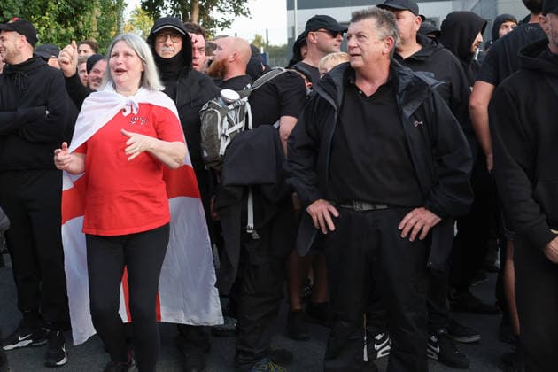 September 24, 2026, Basingstoke, Hampshire, UK: Basingstoke, UK. Members of The Patriot Platform and supporters Protest outside a police station where Daniel Thomas, also know as Danny Tommo, is being held, in Basingstoke, Hampshire. Anti-migrant protester Daniel Thomas has been arrested on suspicion of criminal damage with intent to endanger life after an incident in the English Channel. Basingstoke UK  - ZUMAl94_ 20260924_zaf_l94_031 Copyright: xJacquelinexLawriex