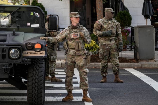 National Guard Deployed as Protesters Demonstrate Against China During Xi Jinping Visit in Washington, DC WASHINGTON, DC, USA SEPTEMBER 24, 2026: Members of the National Guard are deployed near the White House as demonstrators protest against China during Chinese President Xi Jinping™s state visit to Washington, DC. The deployment comes as Xi meets with U.S. President Donald Trump at the White House for official talks. Security measures have been heightened around the presidential complex during Xi Jinping™s state visit to Washington. Copyright: xHasanxAkbasx