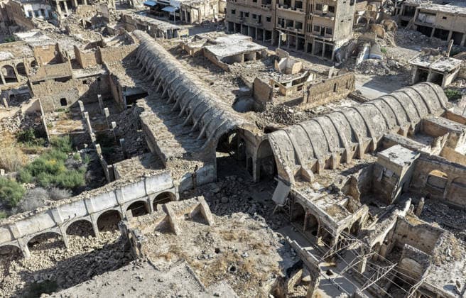 Damaged historical structures in Deir ez-Zor province, bearing the scars of the war in Syria DEIR EZ-ZOR, SYRIA - SEPTEMBER 24: An aerial view of the destruction caused by military bombardments during the Syrian civil war in the area housing the historic Ottoman-era Al-Omari Mosque and Ottoman Covered Bazaar in Deir ez-Zor, Syria, on September 24, 2026. The historic structures were largely destroyed in the attacks. Abdulrhman El Ali Anadolu Deir ez-Zor Syria. Editorial use only. Please get in touch for any other usage.  Copyright: x2026xAnadoluxAbdulrhmanxElxAlix