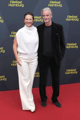 Catrin Striebeck und Jonas Landerschier bei der Festivaleröffnung mit der Premiere des Kinofilms The Idiot(s) auf dem 34. Filmfest Hamburg 2026 im Cinemaxx Dammtor. Hamburg, 24.09.2026