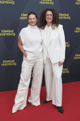 Catrin Striebeck und Malika Rabahallah bei der Festivaleröffnung mit der Premiere des Kinofilms The Idiot(s) auf dem 34. Filmfest Hamburg 2026 im Cinemaxx Dammtor. Hamburg, 24.09.2026
