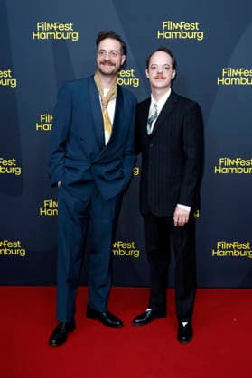 Fridolin Sandmeyer und Merlin Sandmeyer bei der Festivaleröffnung mit der Premiere des Kinofilms The Idiot(s) auf dem 34. Filmfest Hamburg 2026 im Cinemaxx Dammtor. Hamburg, 24.09.2026
