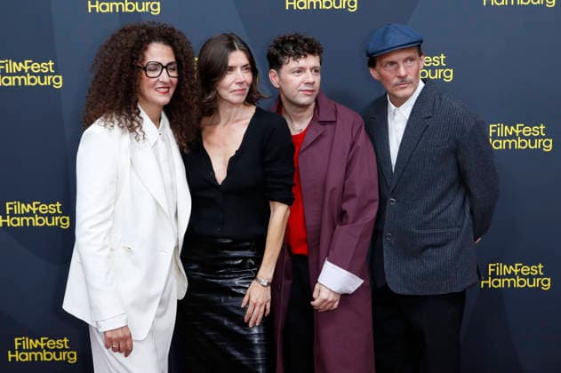 Malika Rabahallah, Malgorzata Szumowska, Christian Friedel und Michal Englert bei der Festivaleröffnung mit der Premiere des Kinofilms The Idiot(s) auf dem 34. Filmfest Hamburg 2026 im Cinemaxx Dammtor. Hamburg, 24.09.2026