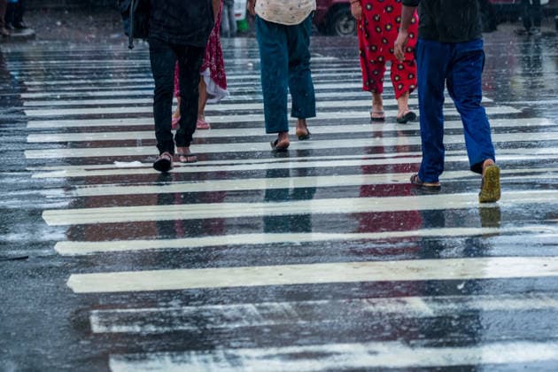 Heavy Rain Affects Daily Activities In Kathmandu. People walk along a street carrying umbrellas amid heavy rainfall in Kathmandu, Nepal, on September 25, 2026. The rainfall has disrupted daily activities as a deep depression over the Bay of Bengal continues to influence weather conditions in the region. Kathmandu bagmati Nepal  Copyright: xAmbirxTolangx originalFilename: tolang-heavyrai260925_npSFQ.jpg