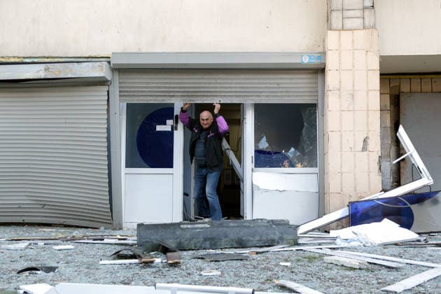 Aftermath of Russian attack on Kyiv - Ukraine A man walks through a door damaged by a Russian drone strike, Kyiv, Ukraine, September 25, 2026. The attack injured at least six people and damaged the High Council of Justice building. Photo by Kyrylo Chubotin Ukrinform ABACAPRESS.COM Kyiv Ukraine  Copyright: xChubotinxKirill Ukrinform ABACAx