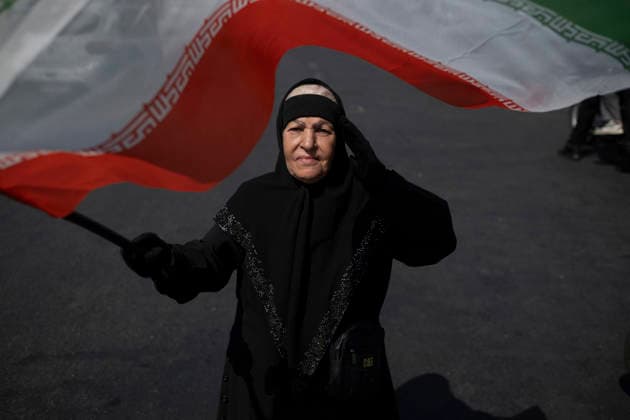 A Rally Of Motorcyclists From Iran™s Self-Sacrificing Forces An elderly pro-government supporter salutes while waving an Iranian national flag during a rally of motorcyclists from Iran s Self-Sacrificing Forces in Tehran, Iran, on September 25, 2026, amid escalating tensions between Iran and the United States. Tehran Tehran Iran  Copyright: xMortezaxNikoubazlx originalFilename: nikoubazl-arallyof260925_nptwE.jpg
