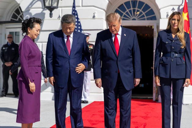 Chinese President Xi Jinping and his wife Peng Liyuan are greeted by President Donald Trump and First Lady Melania Trump as they arrive at the White House in Washington DC on Friday, September 25, 2026. Xi is on the final day of an official three-day state visit to the U.S.  WAX20260925721 SHAWNxTHEW