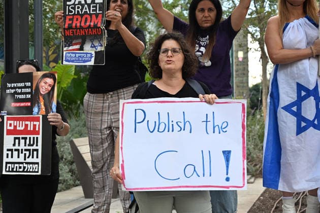 September 25, 2026, Tel-Aviv, Tel-Aviv, Israel: Protesters demonstrate outside the Embassy of the Netherlands, demanding answers regarding a phone call made on the morning of October 7, 2023...At approximately 9.00 a.m. on October 7, before arriving at the Kirya military headquarters in Tel Aviv, Prime Minister Benjamin Netanyahu reportedly chose to make his first call to a foreign leader Ã¢â‚¬ then-Dutch Prime Minister Mark Rutte. Tel-Aviv Israel - ZUMAp227 20260925_zip_p227_005 Copyright: xPaulinaxPatimerx