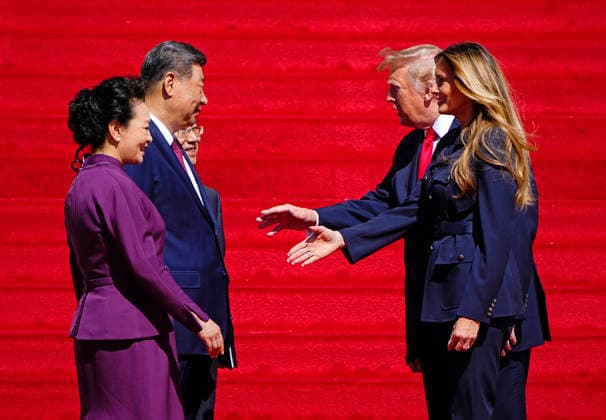 President Donald Trump and First Lady Melania Trump (R) shake hands with Chinese President Xi Jinping and his wife Peng Liyuan as they depart the National Archives in Washington DC on Friday, September 25, 2026. Xi is on the final day of an official three-day state visit to the U.S.  WAP20260925725 BONNIExCASH