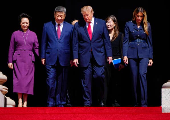 President Donald Trump and First Lady Melania Trump (R) talk with Chinese President Xi Jinping and his wife Peng Liyuan as they depart the National Archives in Washington DC on Friday, September 25, 2026. Xi is on the final day of an official three-day state visit to the U.S.  WAP20260925745 BONNIExCASH