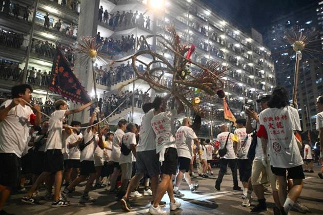 RECORD DATE NOT STATED Hong Kong Pok Fu Lam Village Fire Dragon 2026 Performers performing the fire dragon dance in Wah Fu Estate at Mid-autumn Festival on September 25, 2026 in Hong Kong. (Photo by Kobe Li Nexpher Images) Hong Kong