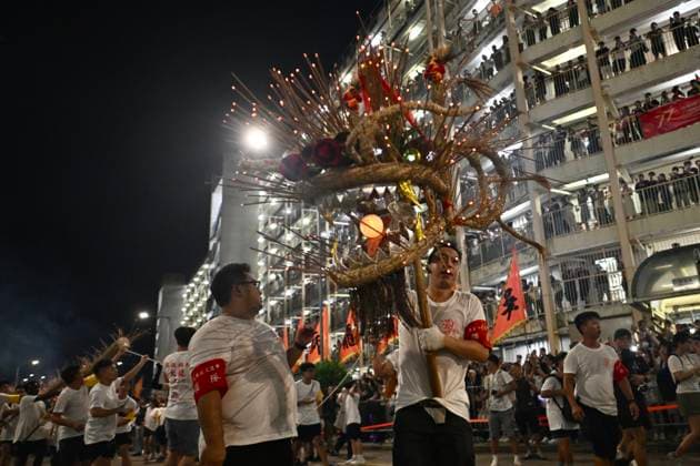 RECORD DATE NOT STATED Hong Kong Pok Fu Lam Village Fire Dragon 2026 Performers performing the fire dragon dance in Wah Fu Estate at Mid-autumn Festival on September 25, 2026 in Hong Kong. (Photo by Kobe Li Nexpher Images) Hong Kong
