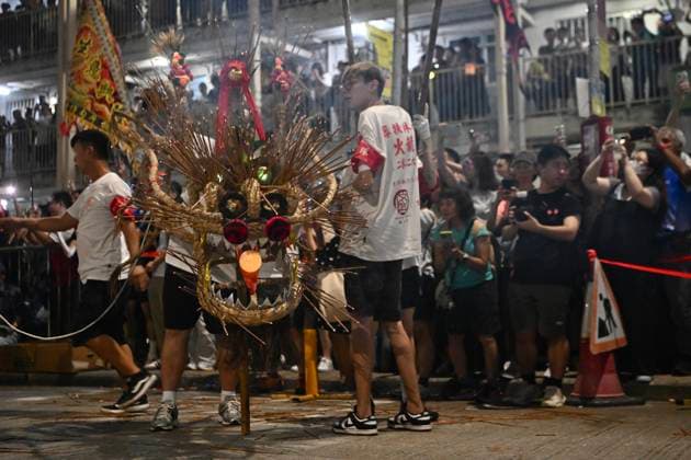 RECORD DATE NOT STATED Hong Kong Pok Fu Lam Village Fire Dragon 2026 Performers performing the fire dragon dance in Wah Fu Estate at Mid-autumn Festival on September 25, 2026 in Hong Kong. (Photo by Kobe Li Nexpher Images) Hong Kong