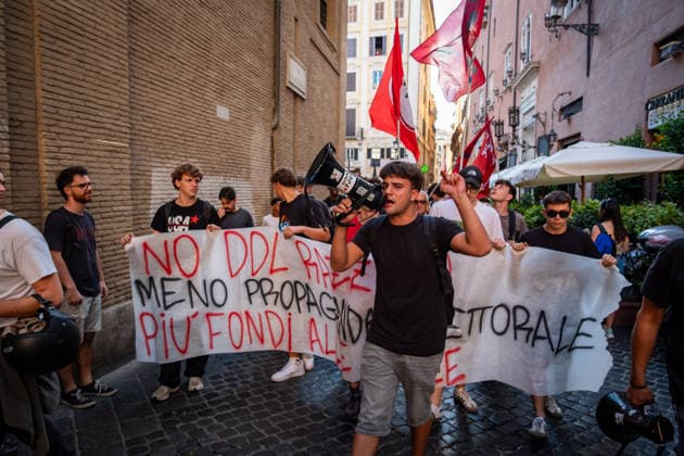 September 25, 2026, Rome, Rm, Italy: Students are taking to the streets to march on Montecitorio - Chamber of Deputies - to protest the new school decree-law issued yesterday by the Meloni government, arguing that the real issues facing schools lie elsewhere. Students call it the Racism Decree because it establishes, among other things, a cap on the number of foreign students per class and bans the wearing of the niqab and burqa during lessons. No to the Racism Decree. Less election campaigning, more funding for schools reads the banner. Rome Italy - ZUMAg256 20260925_znp_g256_006 Copyright: xMarcoxDixGianvitox