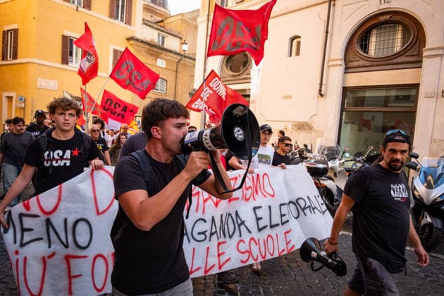 September 25, 2026, Rome, Rm, Italy: Students are taking to the streets to march on Montecitorio - Chamber of Deputies - to protest the new school decree-law issued yesterday by the Meloni government, arguing that the real issues facing schools lie elsewhere. Students call it the Racism Decree because it establishes, among other things, a cap on the number of foreign students per class and bans the wearing of the niqab and burqa during lessons. No to the Racism Decree. Less election campaigning, more funding for schools reads the banner. Rome Italy  - ZUMAg256 20260925_znp_g256_008 Copyright: xMarcoxDixGianvitox