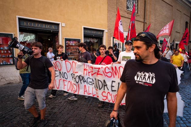 September 25, 2026, Rome, Rm, Italy: Students are taking to the streets to march on Montecitorio - Chamber of Deputies - to protest the new school decree-law issued yesterday by the Meloni government, arguing that the real issues facing schools lie elsewhere. Students call it the Racism Decree because it establishes, among other things, a cap on the number of foreign students per class and bans the wearing of the niqab and burqa during lessons. No to the Racism Decree. Less election campaigning, more funding for schools reads the banner. Rome Italy - ZUMAg256 20260925_znp_g256_004 Copyright: xMarcoxDixGianvitox