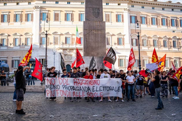 September 25, 2026, Rome, Rm, Italy: Students are taking to the streets to march on Montecitorio - Chamber of Deputies - to protest the new school decree-law issued yesterday by the Meloni government, arguing that the real issues facing schools lie elsewhere. Students call it the Racism Decree because it establishes, among other things, a cap on the number of foreign students per class and bans the wearing of the niqab and burqa during lessons. No to the Racism Decree. Less election campaigning, more funding for schools reads the banner. Rome Italy - ZUMAg256 20260925_znp_g256_003 Copyright: xMarcoxDixGianvitox
