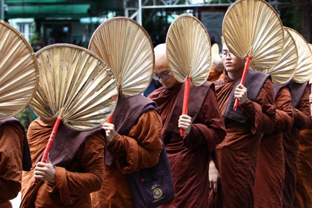 September 25, 2026, Yangon, Yangon Region, Myanmar: Buddhist monks carrying palm fronds arrive during the state-level funeral ceremony for Venerable Bhaddanta Janakabhivamsa, Presiding Abbot of Chan Myay Yeiktha monastery, in Yangon. Venerable Chanmyay Yeiktha Sayadaw Bhaddanta Janaka Bhivamsa, who established monastery branches in major cities across Myanmar and meditation centres in Thailand, South Africa, and the US, passed away at 11:03 a.m. on 19 September at the age of 99, having observed 79 vass. Yangon Myanmar - ZUMAn324 20260925_zip_n324_001 Copyright: xAyexMyaxNaingx