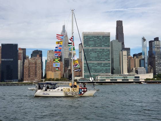 September 25, 2026, Manhattan, New York, U.S.A: New York, New York September 25, 2026..Casa Pueblo protests climate change and wants clean energy. They sailed around Manhattan stopping at Con Edison plant and Big Alice plant in Queens, They cruised by the United Nations and the final stop was in front of the Statue of Liberty.. Clean Energy Now Manhattan U.S.A - ZUMAc272 20260925_znp_c272_004 Copyright: xEmilyxCotlerx
