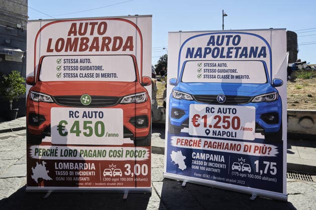 Protest over high gas prices and auto liability insurance in Italy NAPLES, ITALY - SEPTEMBER 26: Two banners show the difference of the auto liability insurance between Lombardy Region and Naples during a protest calling for more fairness in the auto liability insurance sector and concrete measures to address high gas prices in Naples, Italy, on September 26, 2026. In recent days, the national average price at the pump had reached 2.155 euros per litre for gasoline and 2.335 euros for diesel. On the highway network, prices had risen to 2.245 and 2.414 euros per litre, respectively, according to data from the Mimit Fuel Price Observatory. Eliano Imperato Anadolu Naples Italy. Editorial use only. Please get in touch for any other usage.  Copyright: x2026xAnadoluxElianoxImperatox