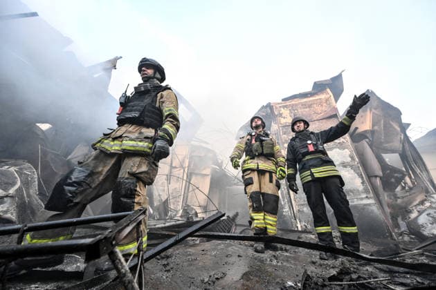 Russian troops strike clothes market in Zaporizhzhia State Emergency Service rescuers work amid burnt-out metal containers at the Central Clothes Market (Anholenko) in Zaporizhzhia, Ukraine, on September 26, 2026. The market sustained significant damage in a Russian drone attack. Zaporizhzhia Ukraine  Copyright: xDmytroxSmolienkox originalFilename: ukrinform-russiant260926_npZXy.jpg