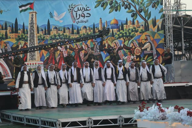Mass Wedding Brings Together 44 Couples in Dura Brides and grooms take part in a mass wedding ceremony for 44 couples in Dura, near the West Bank city of Hebron, on September 26, 2026. Thousands of family members, residents and friends attended the celebration to mark the weddings. Photo by Mamoun Wazwaz apaimages Hebron West Bank Palestinian Territory 260926_Hebron_MW_1_00(10) Copyright: xapaimagesxMamounxWazwazx xapaimagesx