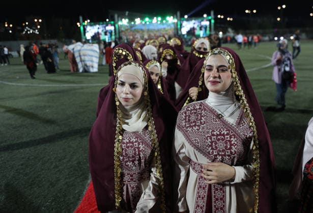 Mass Wedding Brings Together 44 Couples in Dura Brides and grooms take part in a mass wedding ceremony for 44 couples in Dura, near the West Bank city of Hebron, on September 26, 2026. Thousands of family members, residents and friends attended the celebration to mark the weddings. Photo by Mamoun Wazwaz apaimages Hebron West Bank Palestinian Territory 260926_Hebron_MW_1_00(28) Copyright: xapaimagesxMamounxWazwazx xapaimagesx