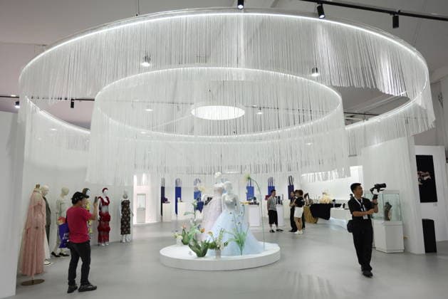 SHANGHAI, CHINA - SEPTEMBER 26: Visitors view exhibits at the Shanghai Design 100+ special exhibition during the 2026 World Design Cities Conference on September 26, 2026 in Shanghai, China. The main exhibition of the conference opened to the public, featuring over 100 selected design achievements covering industry, digital creativity, urban renewal, and cultural consumption.  Copyright: xVCGx 111669823063