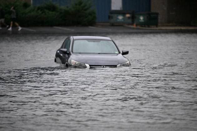 September 26, 2026, Edgewater, New Jersey, USA: A vehicle is seen submerged in flood waters in the parking lot of the Comfort Inn Edgewater on Hudson River during a nor easter storm in Edgewater, New Jersey, United States on Saturday, Sept. 26, 2026. Heavy rain and strong winds battered the northeastern United States as an unusually powerful autumn storm intensified, forcing the cancelation of hundreds of flights and leaving tens of thousands of people without power. New York, Boston and Philadelphia were all in the crosshairs of the Nor easter -- so labeled for its northeasterly winds -- as authorities warned of potential major flooding and road closures. Edgewater USA  - ZUMAs197 20260926_aaa_s197_287 Copyright: xKylexMazzax