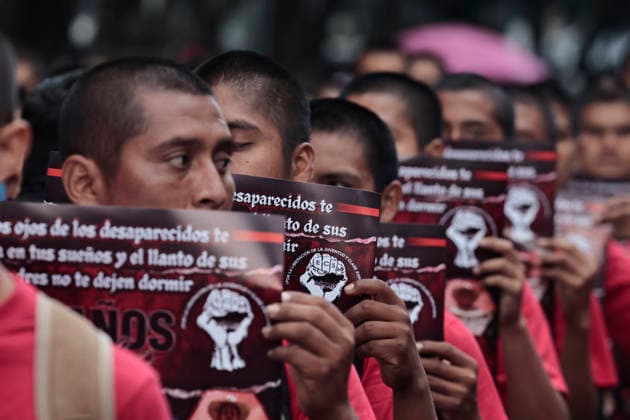 September 26, 2026, Mexico City, Cdmx, Mexico: Parents and relatives of the 43 students from the Raoºl Isidro Burgos Rural Teachers College in Ayotzinapa, Guerrero, marched to mark the 12th anniversary of their forced disappearanceâ€carried out by organized crime in collusion with local police and military forces between September 26 and 27, 2014. Hundreds of students from Ayotzinapa marched alongside activists and the parents of the missing students to demand clarity on the case, as the government has yet to provide precise information regarding the fate of the 43. The demonstration proceeded peacefully from the Angel of Independence monument to the city s Zo³calo; there, on a stage set up in front of the National Palace, the - ZUMAp204 20260926_zip_p204_035 Copyright: xJosuexPerezx