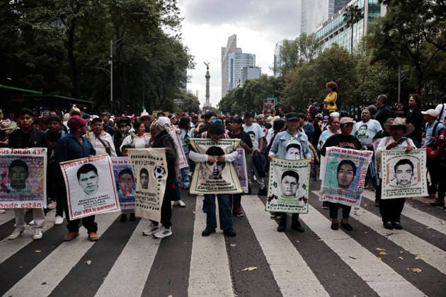 September 26, 2026, Mexico City, Cdmx, Mexico: Parents and relatives of the 43 students from the Raoºl Isidro Burgos Rural Teachers College in Ayotzinapa, Guerrero, marched to mark the 12th anniversary of their forced disappearanceâ€carried out by organized crime in collusion with local police and military forces between September 26 and 27, 2014. Hundreds of students from Ayotzinapa marched alongside activists and the parents of the missing students to demand clarity on the case, as the government has yet to provide precise information regarding the fate of the 43. The demonstration proceeded peacefully from the Angel of Independence monument to the city s Zo³calo; there, on a stage set up in front of the National Palace, the - ZUMAp204 20260926_zip_p204_007 Copyright: xJosuexPerezx