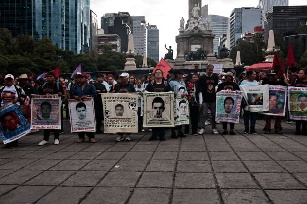 September 26, 2026, Mexico City, Cdmx, Mexico: Parents and relatives of the 43 students from the Raoºl Isidro Burgos Rural Teachers College in Ayotzinapa, Guerrero, marched to mark the 12th anniversary of their forced disappearanceâ€carried out by organized crime in collusion with local police and military forces between September 26 and 27, 2014. Hundreds of students from Ayotzinapa marched alongside activists and the parents of the missing students to demand clarity on the case, as the government has yet to provide precise information regarding the fate of the 43. The demonstration proceeded peacefully from the Angel of Independence monument to the city s Zo³calo; there, on a stage set up in front of the National Palace, the - ZUMAp204 20260926_zip_p204_004 Copyright: xJosuexPerezx