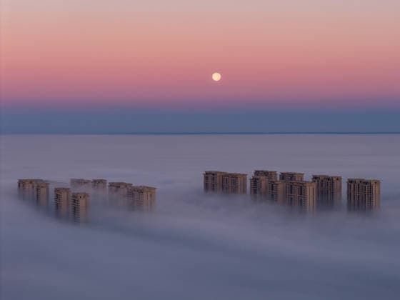 (260927) -- HARBIN, Sept. 27, 2026 -- A drone photo taken on Sept. 27, 2026 shows the full moon in the sky over Zhaodong, northeast China s Heilongjiang Province. (Photo by Xinhua) CHINA-HEILONGJIANG-MOON (CN) LiuxDapeng 