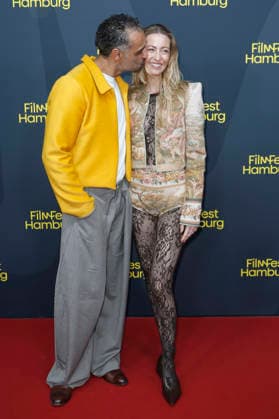 Tamer Trasoglu mit Ehefrau Estelle Adeline Trasoglu bei der Premiere der ARD-Serie Breitscheidplatz 19 12 auf dem 34. Filmfest Hamburg 2026 im Cinemaxx Dammtor. Hamburg, 26.09.2026