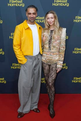 Tamer Trasoglu mit Ehefrau Estelle Adeline Trasoglu bei der Premiere der ARD-Serie Breitscheidplatz 19 12 auf dem 34. Filmfest Hamburg 2026 im Cinemaxx Dammtor. Hamburg, 26.09.2026
