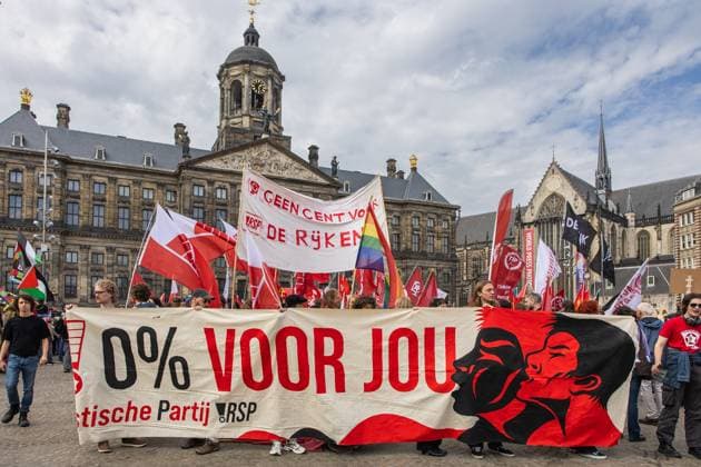 AMSTERDAM Demonstrators participate in the National Peace Protest. The protest on Dam Square and the subsequent march were organized by the Stop War Fever movement, a coalition of progressive organizations concerned about, among other things, rising defense spending. DINGENA MOL ANP netherlands out - belgium out  Copyright: xx x570397061x originalFilename: 570397061