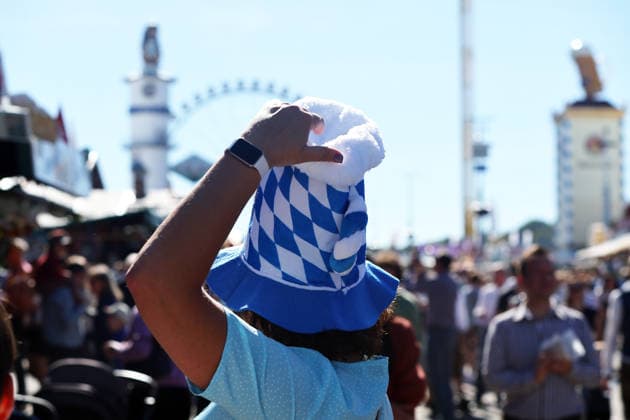 Germany world s largest beer festival Oktoberfest visitor wears a Bavarian hat during the world s largest beer festival Oktoberfest in Munich, Germany, September 27th , 2026 . Photo by Davide Elias Copyright: xDavidexEliasx