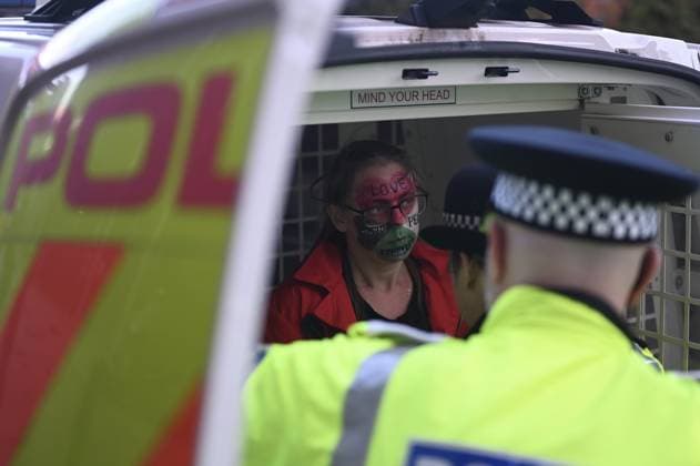 Arrests at the Lift the Ban protest in Liverpool LIVERPOOL, UNITED KINGDOM - SEPTEMBER 27: A protester with their face painted in the colors of the Palestinian flag is seen in a police car after being detained as supporters of Palestine Action are detained by police during a Lift the Ban rally outside the venue of the Labour Party Conference as they call for the lifting of the ban on the group, in Liverpool, United Kingdom on September 27, 2026. Rasid Necati Aslim Anadolu Liverpool United Kingdom. Editorial use only. Please get in touch for any other usage.  Copyright: x2026xAnadoluxRasidxNecatixAslimx