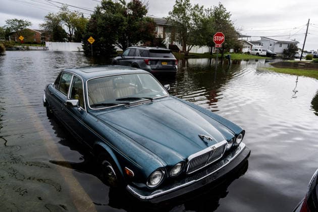 Nor’easter storm causes major coastal flooding in Long Island NEW YORK, UNITED STATES - SEPTEMBER 27: A car sits partially submerged in deep floodwaters following severe coastal flooding triggered by a powerful Nor’easter in Lindenhurst, Long Island, New York, United States on September 27, 2026. A powerful Nor’easter storm battered coastal communities across the region, causing widespread flooding and severe tidal surges. Thomas Hengge Anadolu New York United States. Editorial use only. Please get in touch for any other usage.  Copyright: x2026xAnadoluxThomasxHenggex