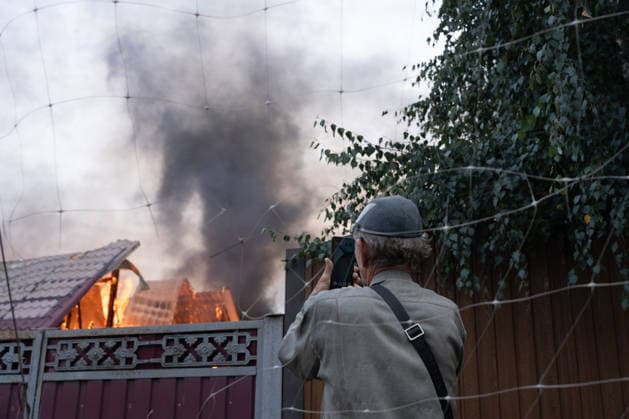 September 27, 2026, Sloviansk, Donetsk Oblast, Ukraine: A local Resident films the aftermath of a Russian drone attack on a residential area in the frontline city of Sloviansk, Donetsk Oblast, Ukraine, September 28, 2026. Sloviansk Ukraine - ZUMAm350 20260927_zip_m350_008 Copyright: xCameronxJones-Manleyx