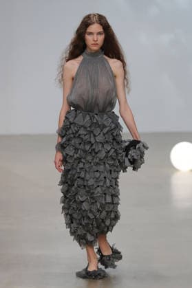 PFW - CFCL Runway A model walks the runway during the CFCL Ready to Wear Fall Winter 2026-2027 fashion show as part of Paris Fashion Week on March 10, 2026 in Paris, France. Photo by Alain-Gil Gonzalez ABACAPRESS.COM Paris France  Copyright: xGonzalezxAlain-Gil ABACAx