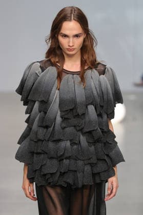 PFW - CFCL Runway A model walks the runway during the CFCL Ready to Wear Fall Winter 2026-2027 fashion show as part of Paris Fashion Week on March 10, 2026 in Paris, France. Photo by Alain-Gil Gonzalez ABACAPRESS.COM Paris France  Copyright: xGonzalezxAlain-Gil ABACAx