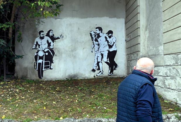 IPA89393691 - MILAN - October 7, 2026 - A mural by Alexandro Palombo, an artwork on display on October 7 at the Museum of Modern Art, located at 16 Via Palestro, dedicated to the young couple kidnapped during the attack on the Nova Music Festival  Copyright: xMaurizioxMaulex xMaurizioxMaulex IPA89393691