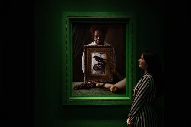 Tim Walker s Fairyland: Love and Legends Photo Call at National Portrait Gallery, London, UK - 7 October 2026 A staff member views Olivette Cole-Wilson, and blackbird by Tim Walker as part of The National Portrait Gallery s Tim Walker s Fairyland: Love and Legends Exhibition which runs from 9th October 2026 - 7th February 2027 at National Portrait Gallery in London, England, UK on Wednesday 7 October, 2026., Credit:Justin Ng Avalon UK, England, London, National Portrait Gallery  Copyright: xJustinxNgx xAvalonx 1141202413