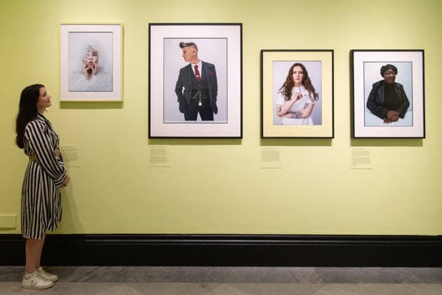 Tim Walker s Fairyland: Love and Legends Photo Call at National Portrait Gallery, London, UK - 7 October 2026 A staff member views (L-R) - Shon Faye , Joelle Taylor , Alice Oseman , Lady Phill all by Tim Walker as part of The National Portrait Gallery s Tim Walker s Fairyland: Love and Legends Exhibition which runs from 9th October 2026 - 7th February 2027 at National Portrait Gallery in London, England, UK on Wednesday 7 October, 2026., Credit:Justin Ng Avalon UK, England, London, National Portrait Gallery  Copyright: xJustinxNgx xAvalonx 1141202420