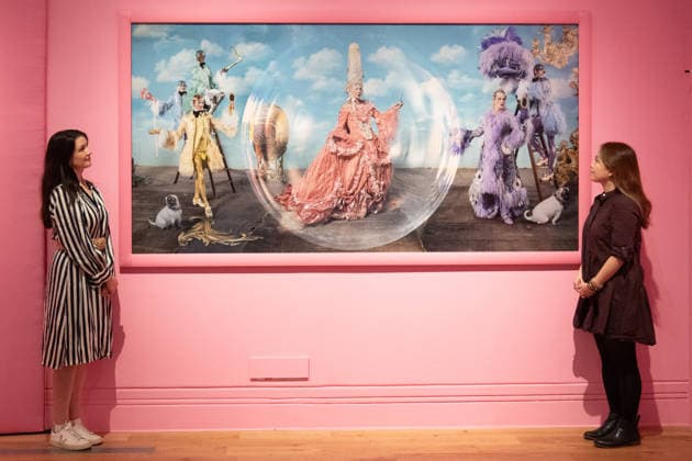 Tim Walker s Fairyland: Love and Legends Photo Call at National Portrait Gallery, London, UK - 7 October 2026 A staff member views Paul O Grady and Julian Clary as the Glitter Queens, with Harry Browse, Rae and Liam Elias as the Glitter Boys by Tim Walker as part of The National Portrait Gallery s Tim Walker s Fairyland: Love and Legends Exhibition which runs from 9th October 2026 - 7th February 2027 at National Portrait Gallery in London, England, UK on Wednesday 7 October, 2026., Credit:Justin Ng Avalon UK, England, London, National Portrait Gallery  Copyright: xJustinxNgx xAvalonx 1141202447